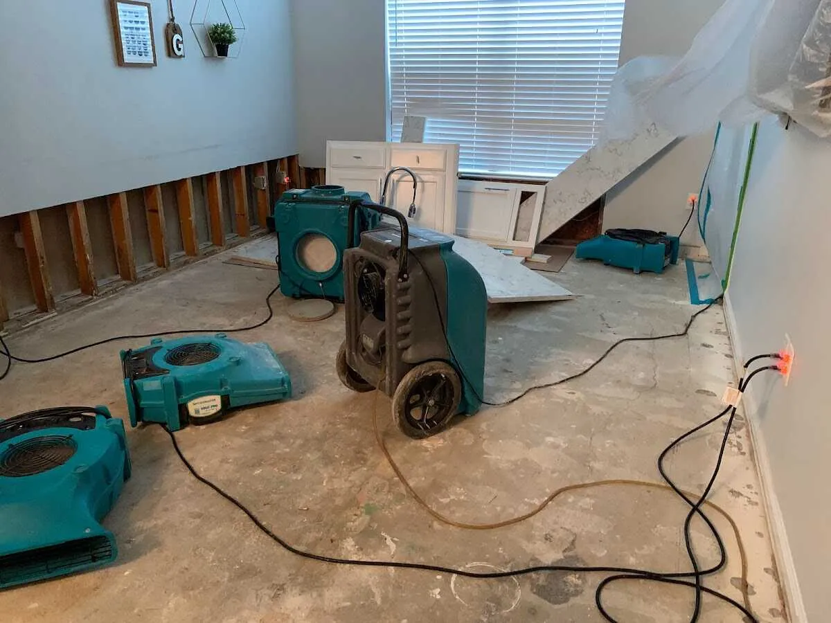 Dehumidifier in flood-cut room for Water Damage Restoration in Clarkdale